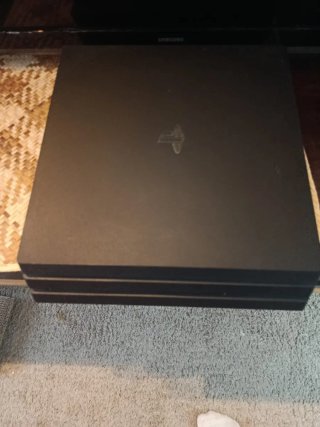 PS4 (PlayStation 4) Negra + Accesorios