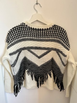 Jersey de punto con flecos