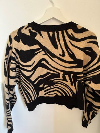 Jersey estampado cebra beige y negro