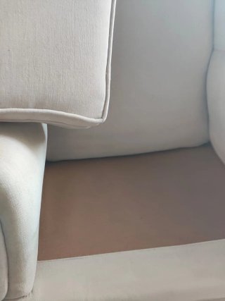 Sillón orejero beige tela