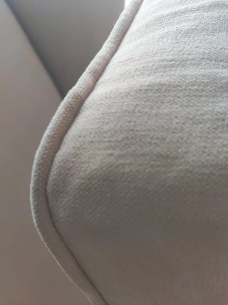 Sillón orejero beige tela