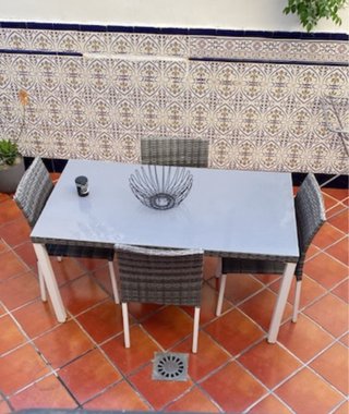 Set tavolo da esterno in metallo e vimini sintetico