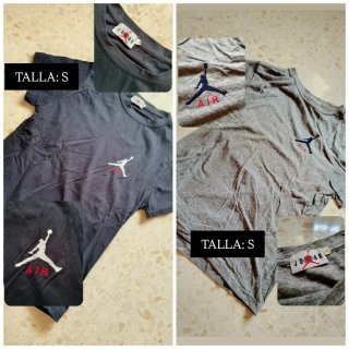 Caja de camisetas de distintas marcas y tallas.