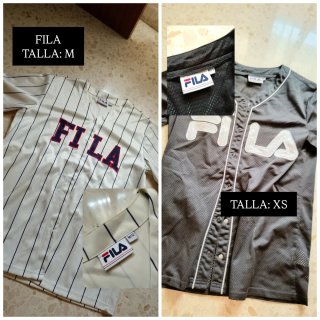 Caja de camisetas de distintas marcas y tallas.