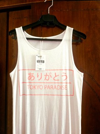 Vestido playero blanco con flecos