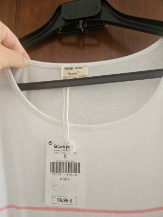 Vestido playero blanco con flecos