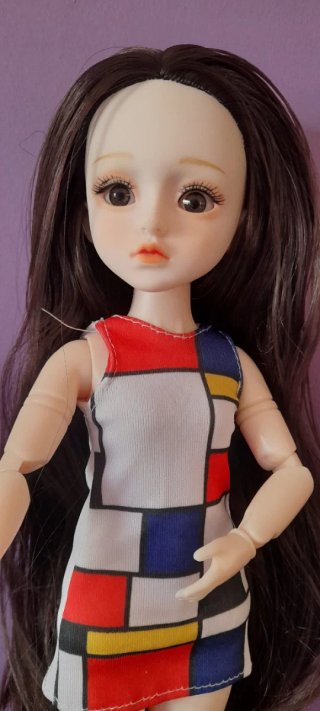 Muñeca articulada estilo Mondrian