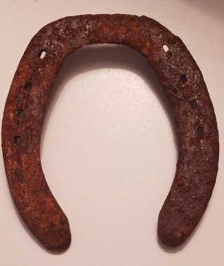 Herradura antigua de hierro.