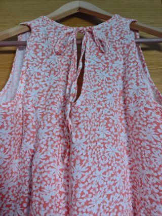 Mono corto floral coral