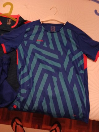 Conjunto deportivo niño azul y naranja