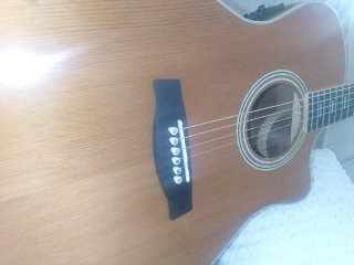 Guitarra Acústica  vendo cambio