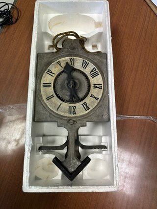 Reloj de péndulo mecánico antiguo
