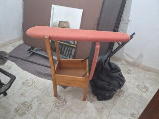 Silla convertible en tabla de planchar