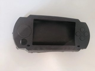 PSP Cargador + 2 Juegos UMD + Funda