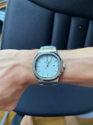 Reloj Poedgar Plata y Blanco