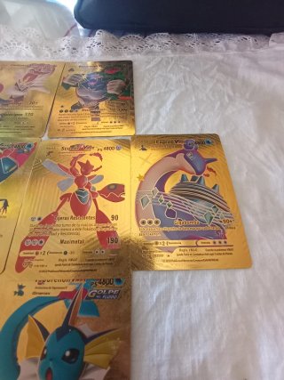 Cartas Pokémon Doradas VMAX