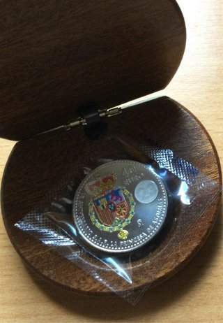 Estuche de madera para monedas