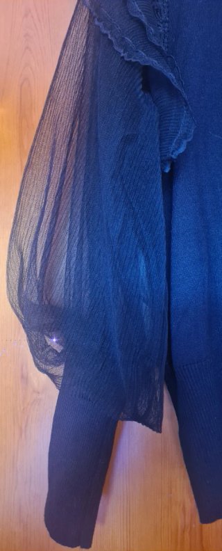 Jersey negro mangas abullonadas transparentes