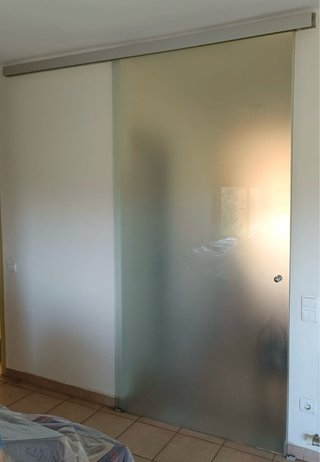 Puerta corredera de cristal