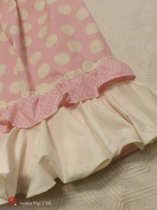Falda y mantoncillo lunares rosa