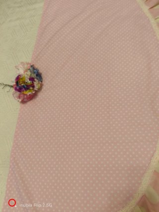 Falda y mantoncillo lunares rosa