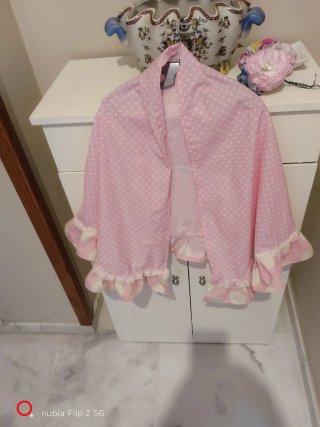 Falda y mantoncillo lunares rosa