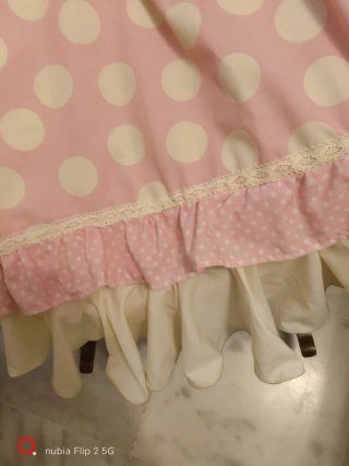 Falda y mantoncillo lunares rosa