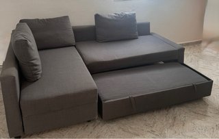 Sofá modular gris en buen estado