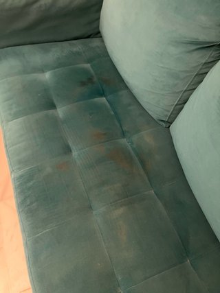 Sofá de terciopelo azul petróleo
