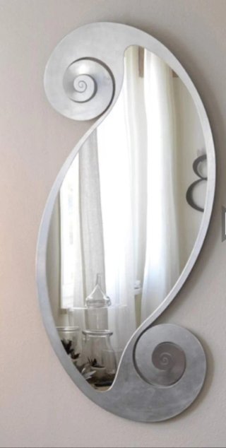 Espejo decorativo plateado diseño moderno