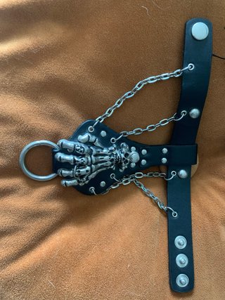 Pulsera cuero garra esqueleto cadena