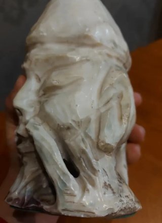 Escultura mármol cabeza hombre asiático