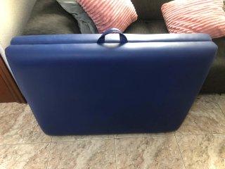 Cama de masaje azul plegable