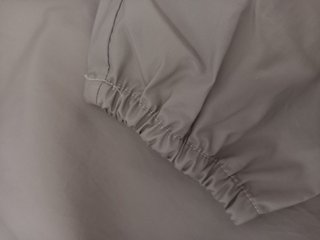Chubasquero Quechua beige POCO USO. Talla XS-S.