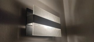 Aplique de pared de cristal y metal