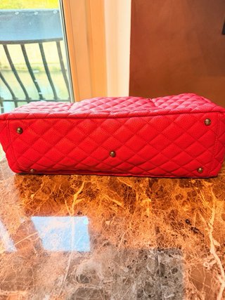 Borsa da viaggio Chanel pelle rossa martellata