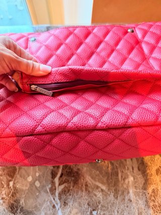 Borsa da viaggio Chanel pelle rossa martellata