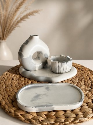 Set di pezzi in ceramica e cemento