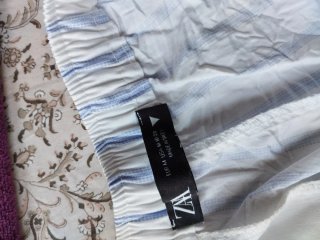 Pantalón fluido rayas azules y blancas