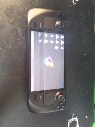 Steam Deck oled,con funda y cargador.