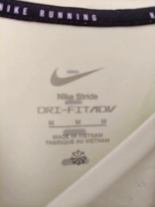Camiseta Running Nike ADV Amarilla