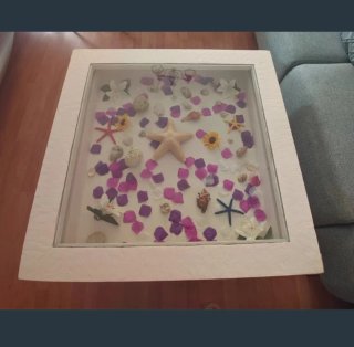 Mesa de centro blanca con tapa de cristal