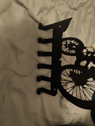 Colgador de pared con diseño de ciclista de metal