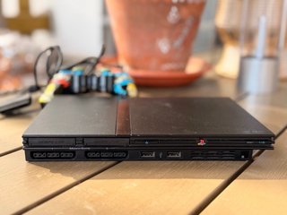 Playstation 2 PS2 Slim + Mando Simpson