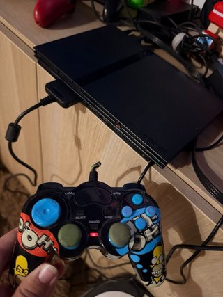 Playstation 2 PS2 Slim + Mando Simpson