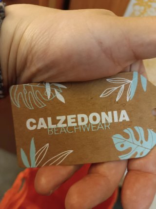 Vestito corto arancione Calzedonia pizzo Sangallo