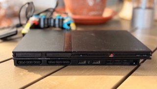 Playstation 2 Slim + Mando Simpson