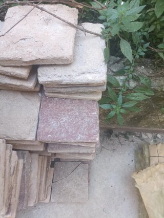 Tova ceràmica manual vermella Més de 2000 peces