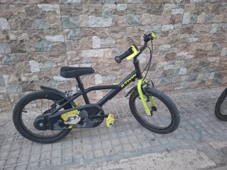 Bicicleta infantil Btwin amarilla