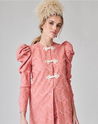 Traje Coosy color coral.  Usado una vez.